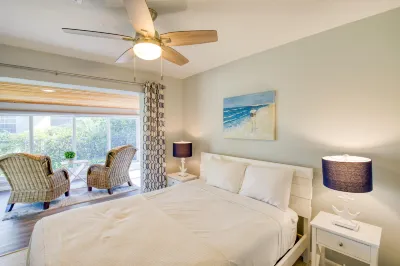 Large, cozy condo a walk from the beach with central AC and shared yard