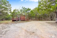 Charming Cabin with Cozy Fireplace and Scenic Porch - Serene Retreat