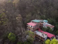 Hill Top Swiss Cottage Hotels in Rishikesh