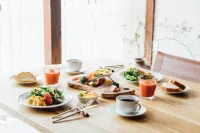 مينكا ريفر سايد فيلاز فنادق في إميزو