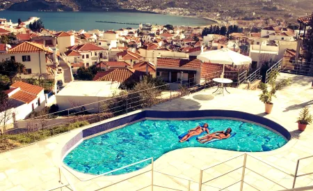 Thea Home Hotel by Booking Kottas Отели рядом с достопримечательностью «Скопелос»