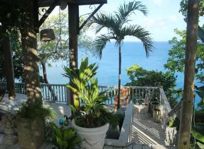Spectacular clifftop house with hot tub next to sandy beach, stunning sea views Hotels near Guana Island