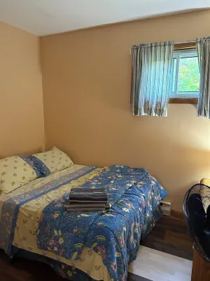 Cozy two bedroom cabin shores of Lake Nipissing. Enjoy the pool and lake views.