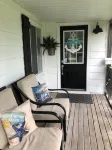 Seconds to the beach, our coastal farmhouse themed family cottage