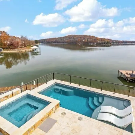 Stunning Views! Lakefront Luxury w Saltwater Pool, Spa, & Deep-Water Dock