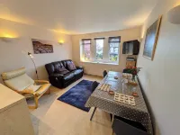 Cosy yet spacious property with private parking, close to the village centre.
