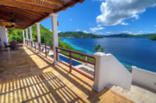 Ocean Front Luxury w/ sea access and dock on Private Peninsula w/amazing sunsets