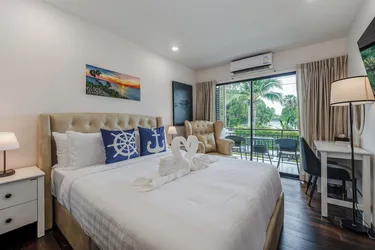 รูปภาพของอพาร์ตเมนต์ที่เป็นระเบียบใน โครงการเดอะ ไทเทิล 50 เมตรถึงชายหาด ซี155