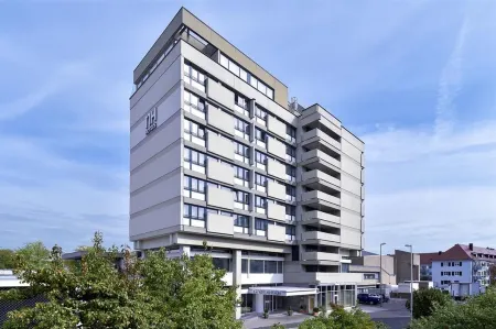 NH Erlangen Отели рядом с достопримечательностью «Университет Эрлангена — Нюрнберга»