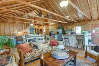 Lakefront Log Cabin Retreat w/ Hot Tub + Kayaks!