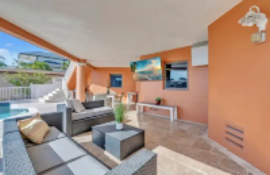 Indulge in Luxury at This Expansive Three-Story Waterfront Retreat.