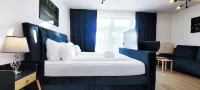 Terrasse - Parkplatz - TV im Boxspringbett - Küche