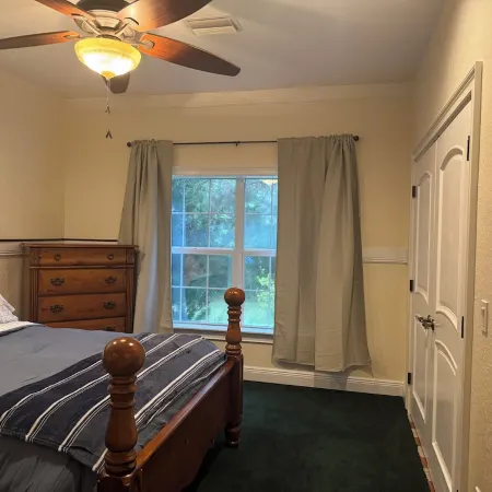 Escape to this serene 4-bedroom home set on 10 private acres.