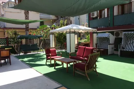 El Latino Otel Отели рядом с достопримечательностью «Çekirdeksiz Mandalin Camping Kemer Antalya Çadır Karavan Kamp Alanı»