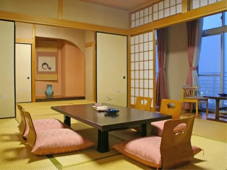 Miyajimakan Отели в г. Нисио