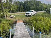 Cute Cabin on Big Pine Lake with a Large Fenced Yard and Lake Access Hotels in Pine County