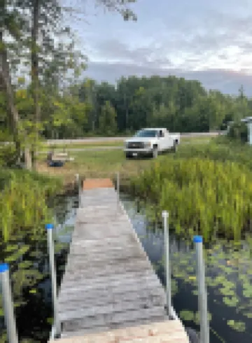 Cute Cabin on Big Pine Lake with a Large Fenced Yard and Lake Access