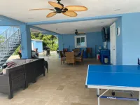 Large outdoor space with pool/hot tub, on 200ft wide canal- quick ride to Ocean!