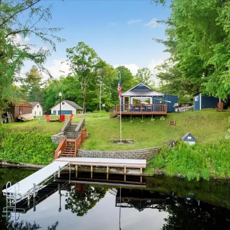 The quintessential lakeside cabin. Tradition meets today. Family, friends, pets!