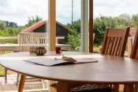 Vacation home with private sauna and private access/jetty to the Peene Hotels in Neukalen