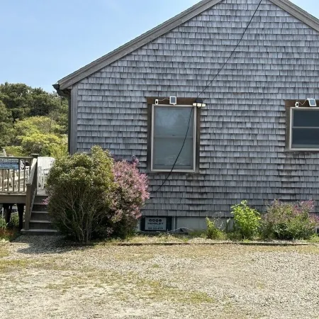 This Two-Bedroom Cottage Features One Queen Bed, Two Twin Beds, and a Sofa Bed.
