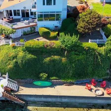 Waterfront Villa with Private Beach, Hot tub, EV & WFH