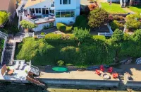 Waterfront Villa with Private Beach, Hot tub, EV & WFH