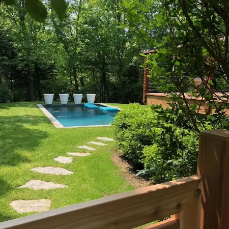 Mid-Century Home with Pool, Private Beach Access, and Long-Stay Summer Savings