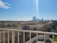 A beautiful beachfront property stunning  views of the beach, and Atlantic City.