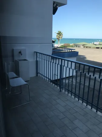 Apartment first row sea, air conditioning, flat screen TV,