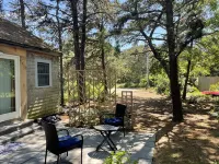 Modernized, renovated, cozy cottage steps away from a private beach.
