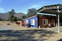 Our Cowboys Hideout is on a working horse ranch with spectacular mountain views!