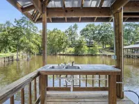 Magnolia Place by Toledo Town and Tackle on Lanan Bay