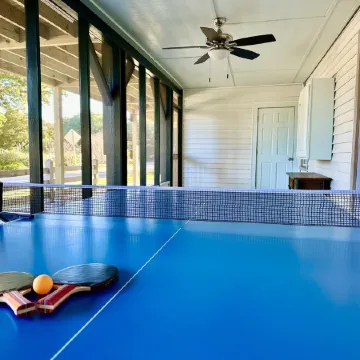 Classic Pawleys. Just Renovated. Long, breezy porches. Steps to beach and creek.