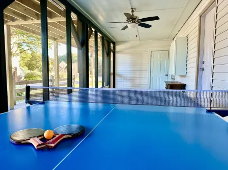 Classic Pawleys. Just Renovated. Long, breezy porches. Steps to beach and creek.