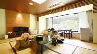 Koga No Okuzashiki Okawara Onsen Kamoshikasou Hotel di Hino