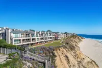 Oceanfront Luxury Retreat with Swimming Pools and Tennis Courts - Charming Coastal Escape