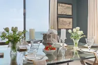 Stunning Views and Access to Beach and Pool - Elegant Oceanfront Retreat