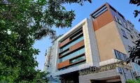 Treebo Lazystay Grand Patia Hotels near V-Mart