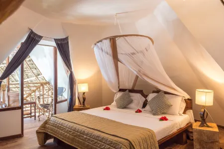 Villa Kiva Boutique Hotel Отели рядом с достопримечательностью «Мнемба»