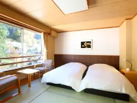 Ryokan Sakaya Hotels near Oborozukiyo no Yakata Hanzan Bunko