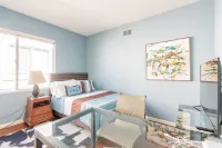 Luxe family home w/ 116 inch theatre, near beach w/ private yard & EV chargers