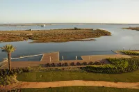 1 bedroom apartment in the Algarve overlooking the ria and the sea with garden and pool