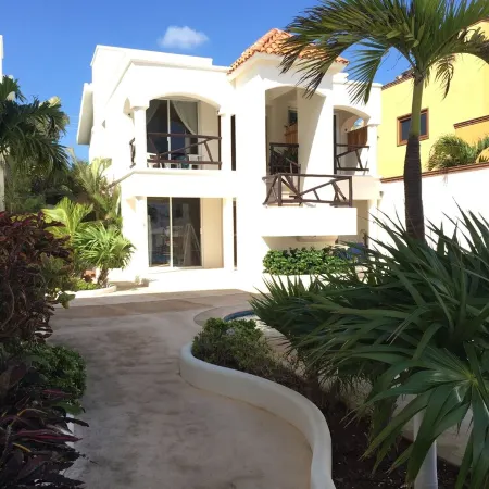 Quiet and serene ocean front 2-bedroom 2-bathroom condo, steps from the sand!