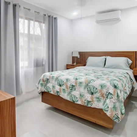 Minimalist Condo with a Beautiful New Design, Enclosed Patio, and Shared Community Pool