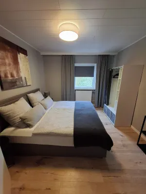 Modern vacation apartment Fuldaliebe with balcony, idyllic on the river, cycle path Fulda+Weser