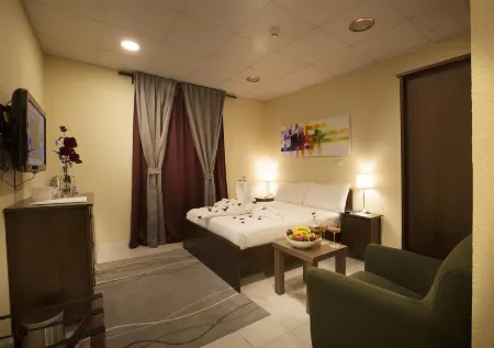 Palms Lily Hotel Suites Отели в г. Эль-Мубарраз