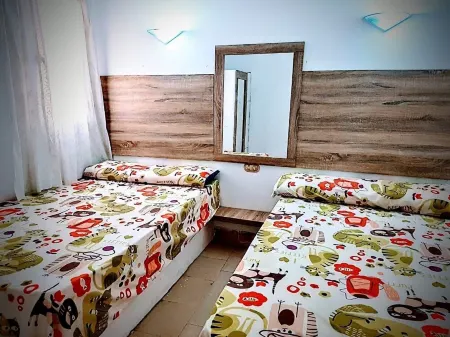 Warm vacation home with Garden Отели рядом с достопримечательностью «Beach for Swiss Inn TEDA»