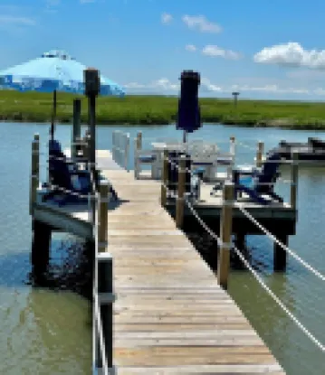 Charming StoneHarbor WATERFRONT back-bay cottage minutes to beautiful SH beaches