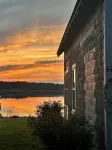 Delightful waterfront cottage with beautiful views of the sunset.